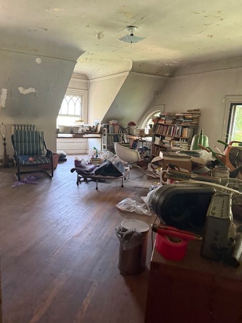 top floor with wood floor and lots of stuff