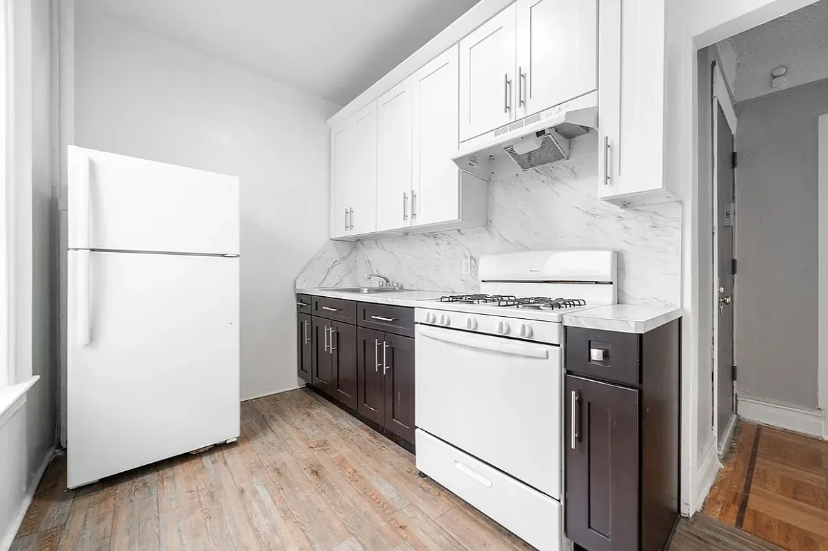 kitchen with mix of cabinet colors