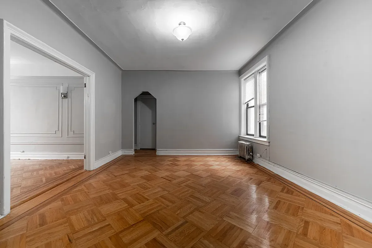 sunset park - living room with wood floor, wall moldlings
