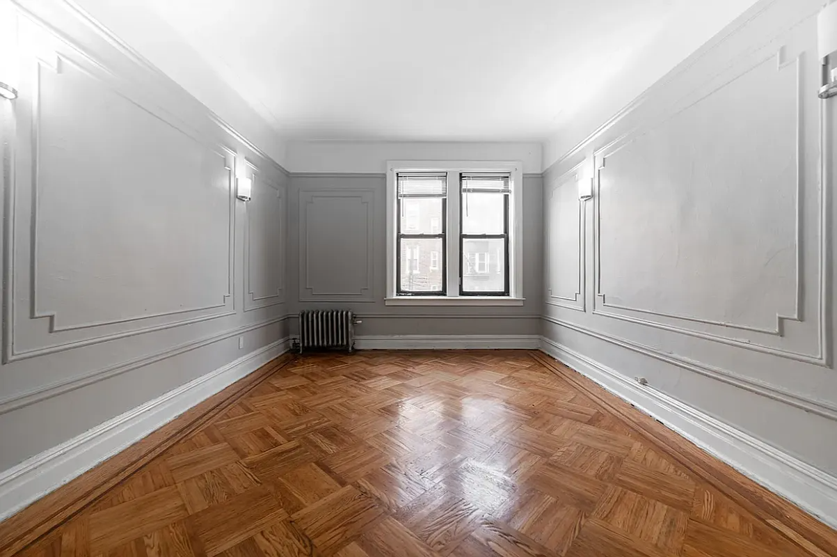 living room with gray walls and wall moldings