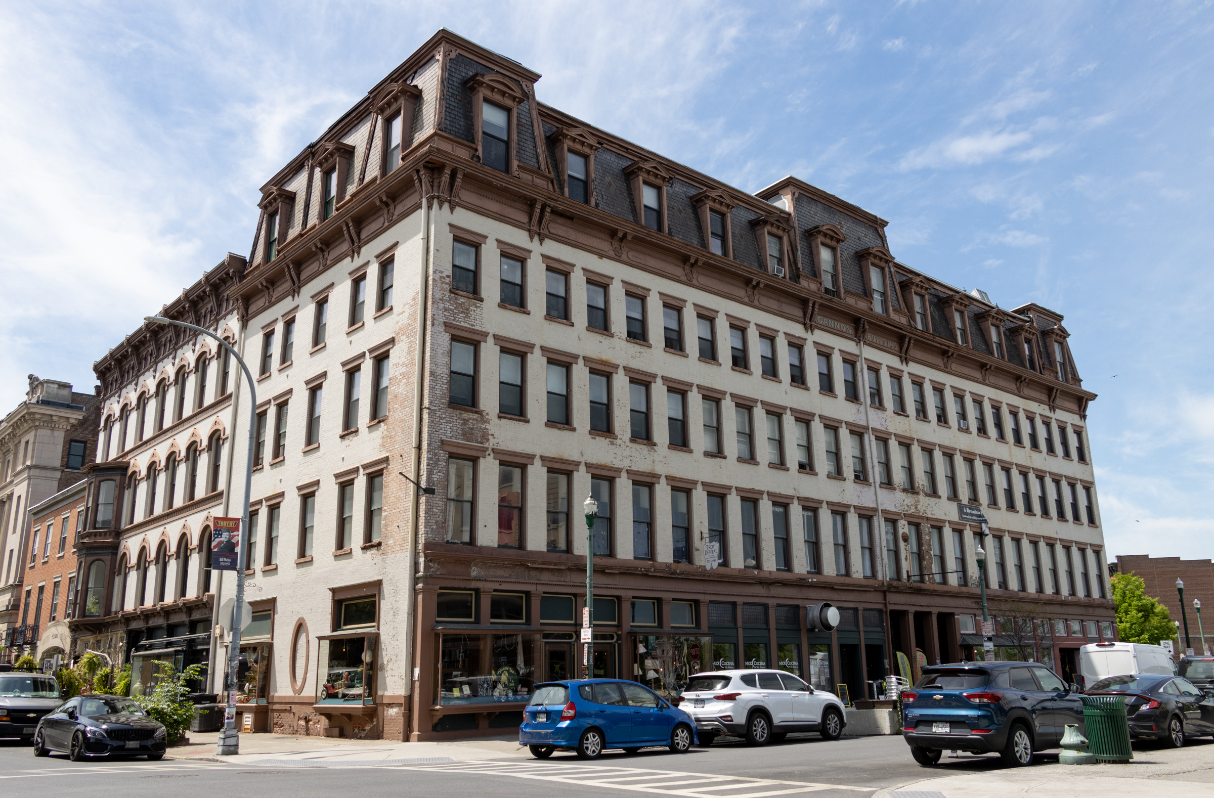 commercial building with a mansard roof