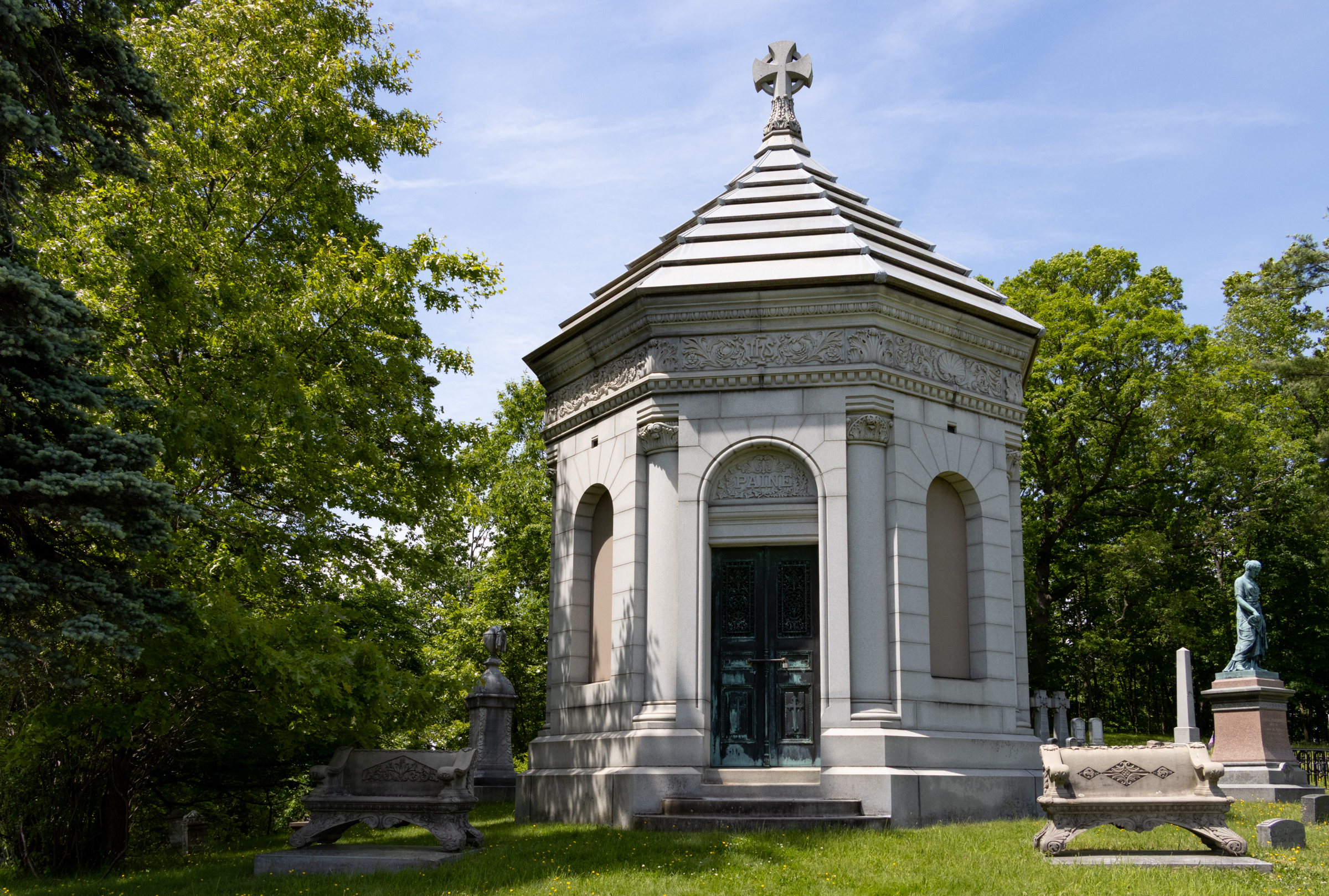 paine carved above the entrance to a masoleum