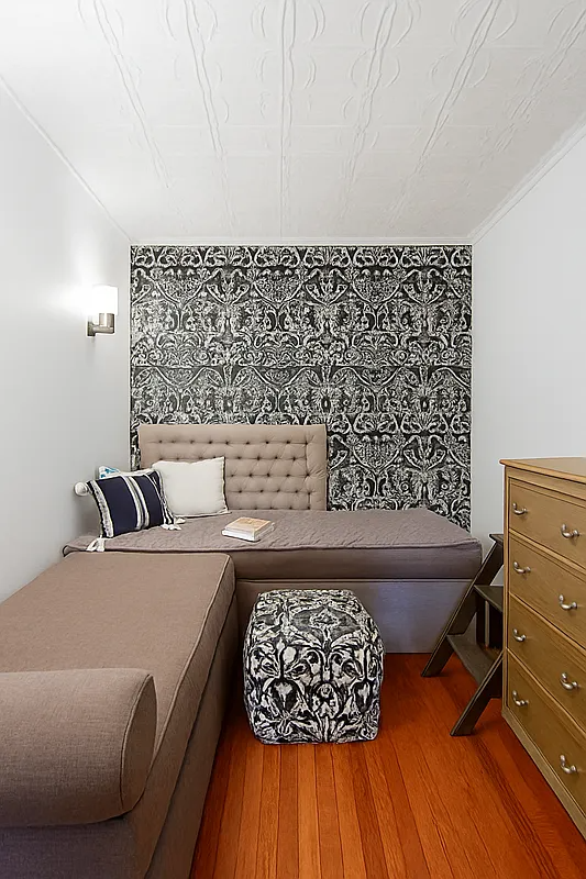 bonus space with tin ceiling, room for a sofa