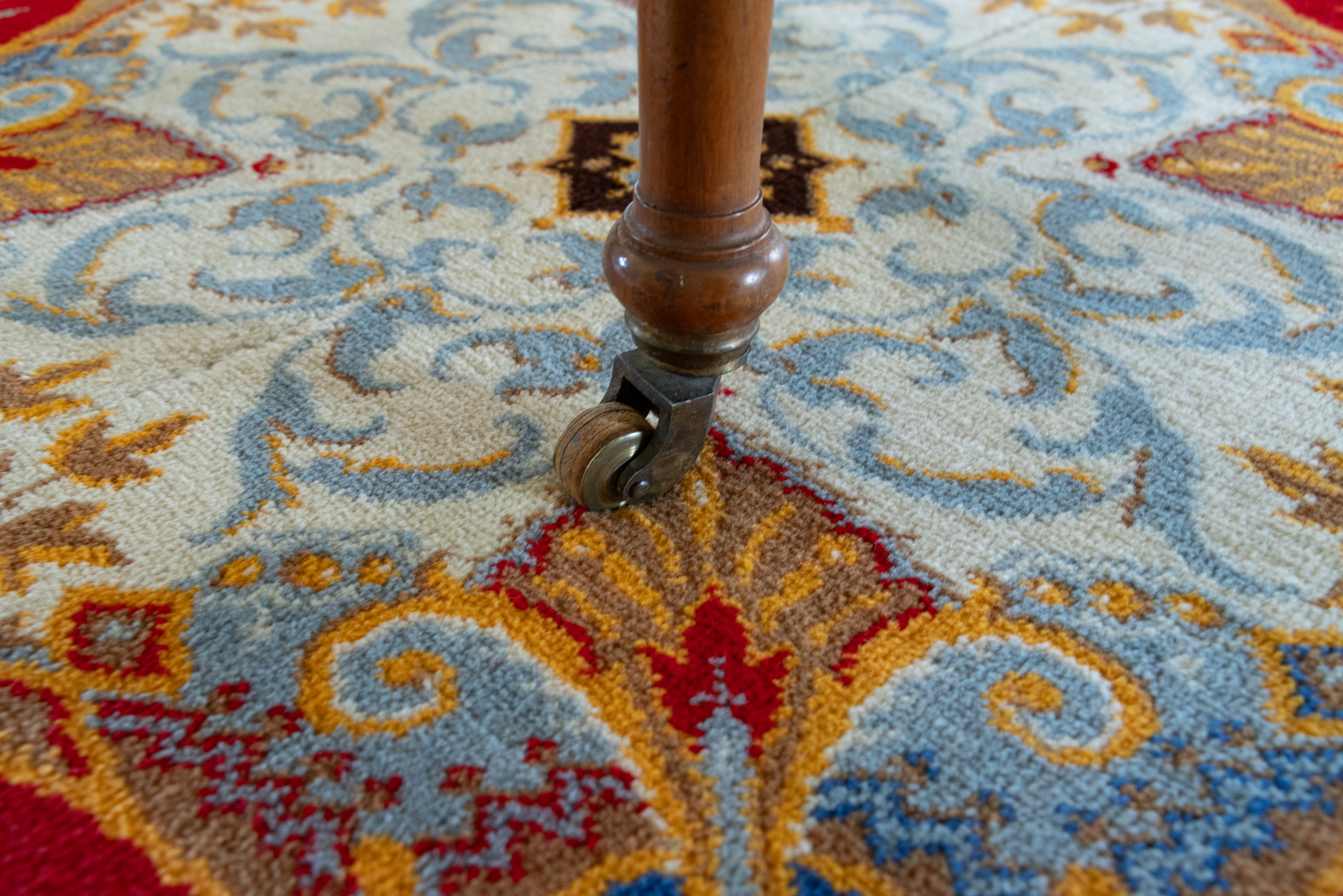 an orange and blue pattered carpet