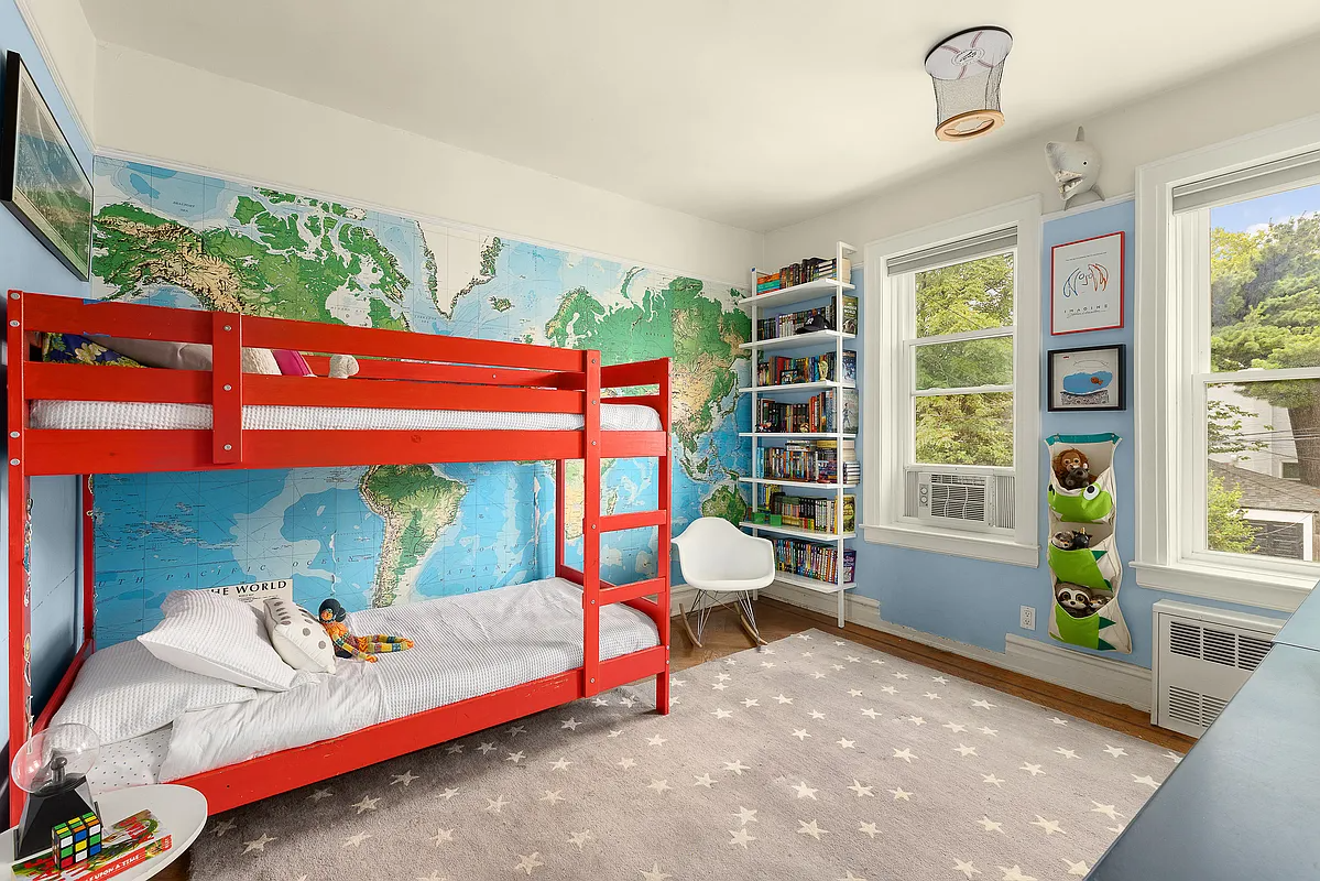 bedroom with blue walls, picture rails and room for bunkbeds