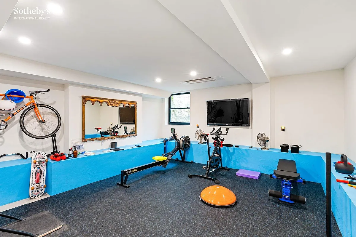 gym with carpet, white walls