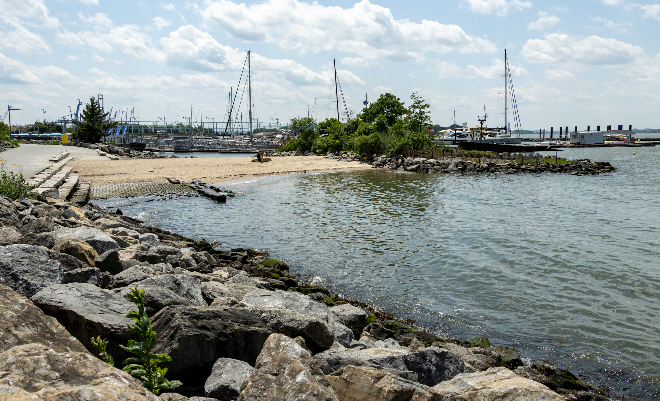 waterfront with marina in the distance