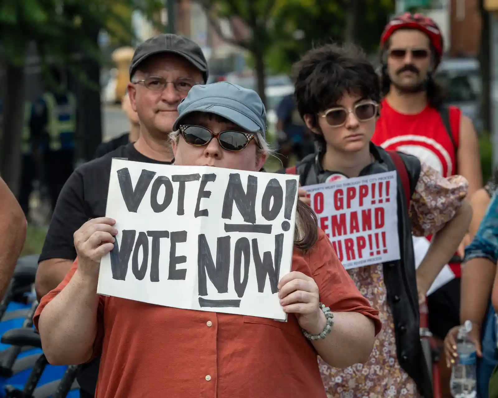 person at protest with sign
