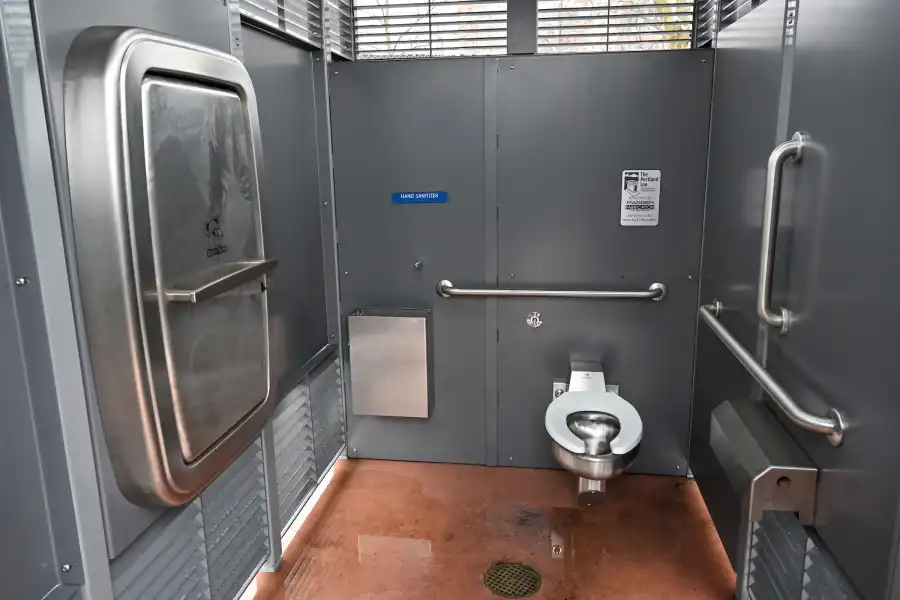 the stainless steel interior of a bathroom