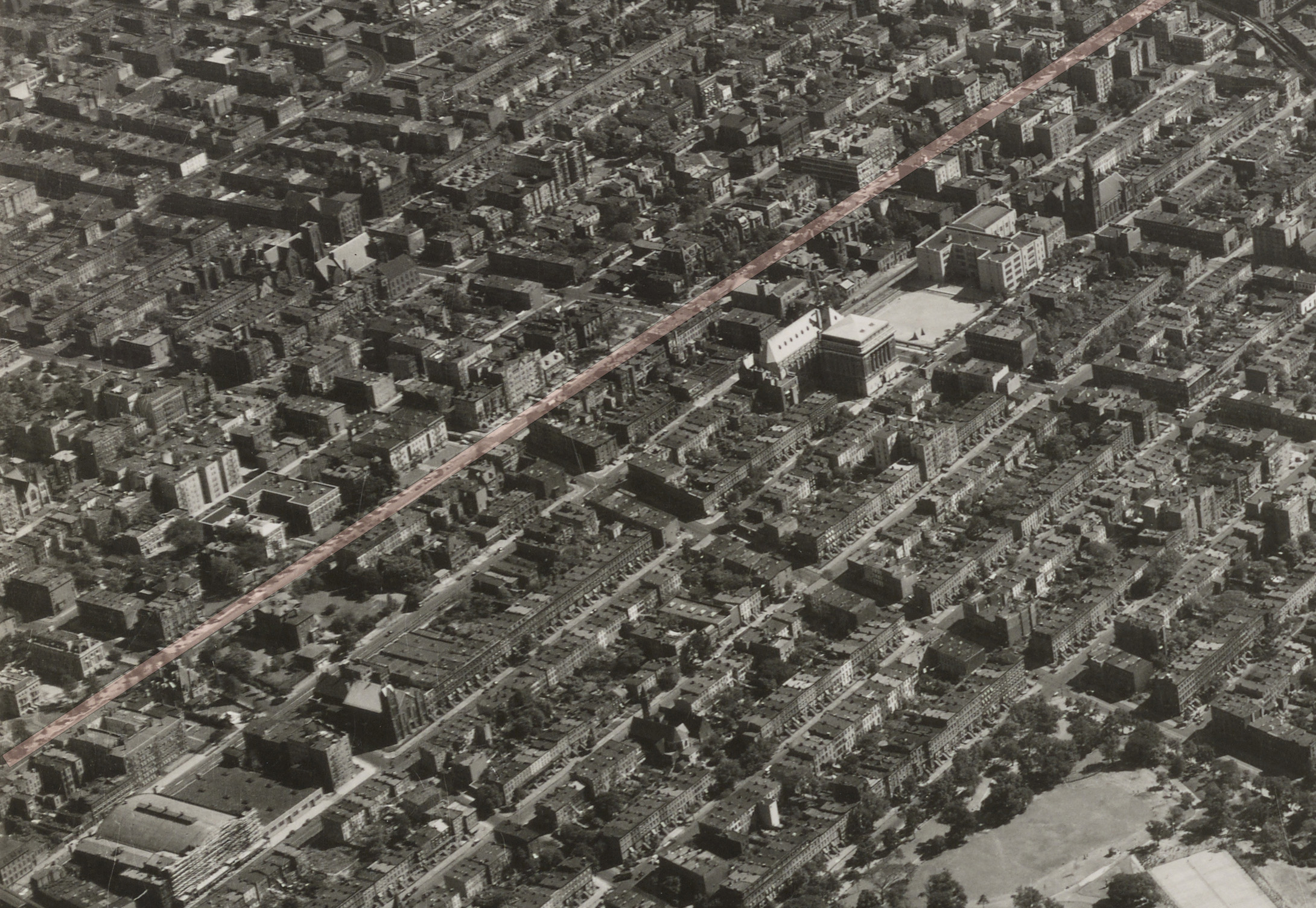an black and white aerial showing buildings in clinton hill