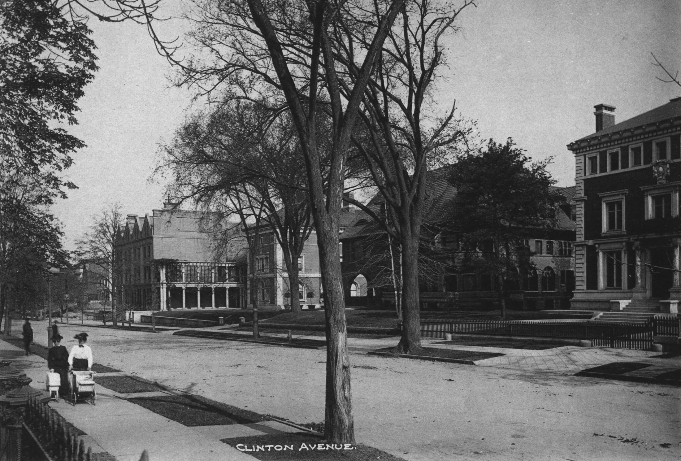 a black and white photo showing mansions on clinton avenue and people walking on a sidewalk