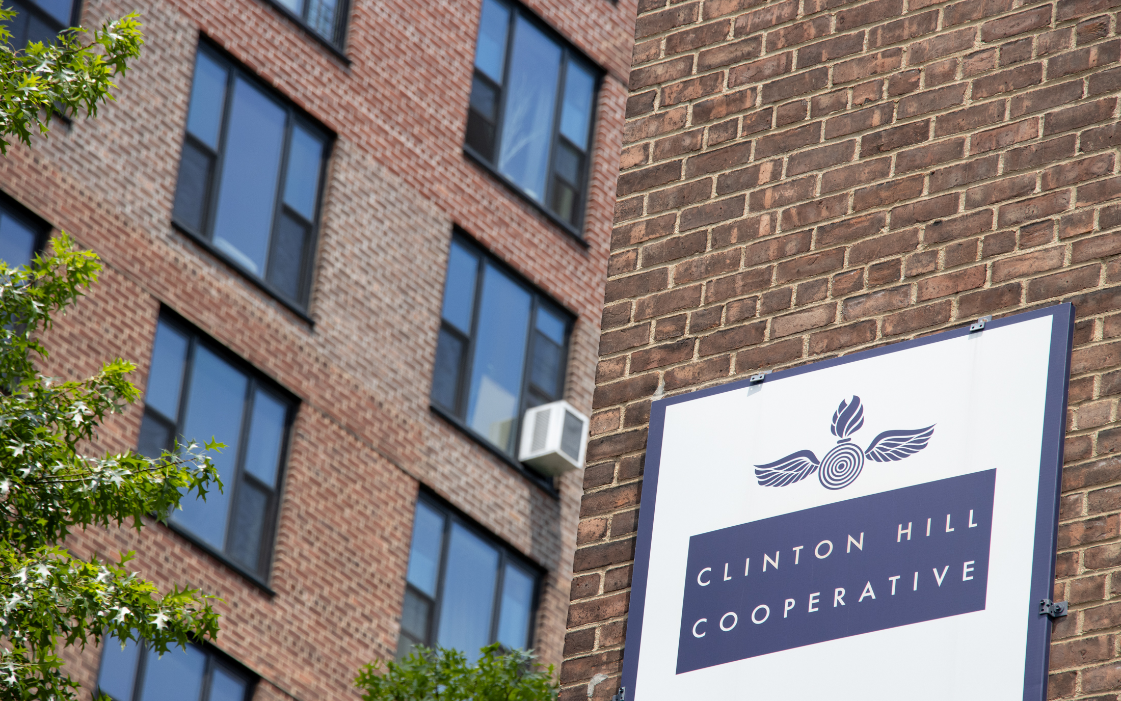 a sign for clinton hill cooperatives