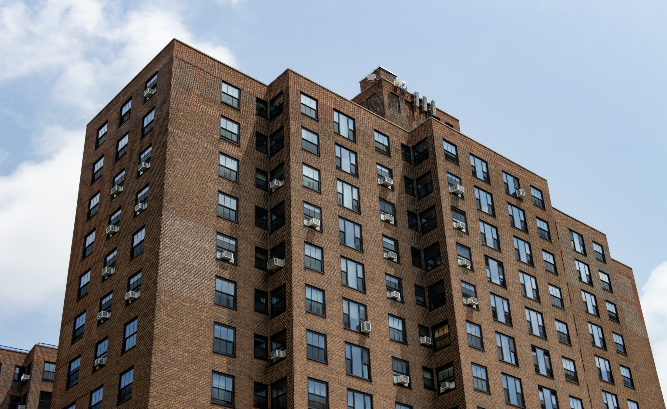 top of a brick apartment building