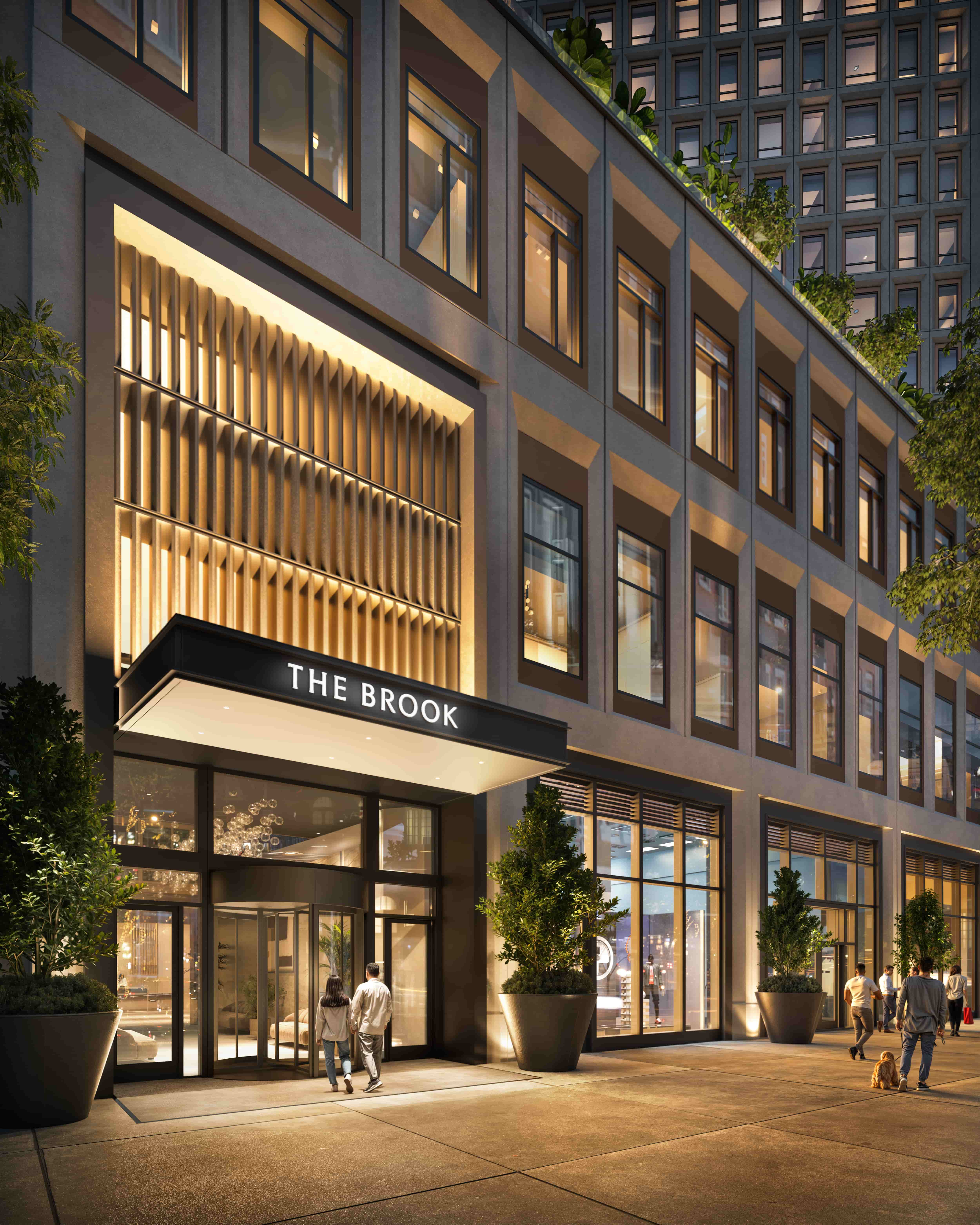 nighttime rendering of the entrance with "The Book" lettered on a canopy