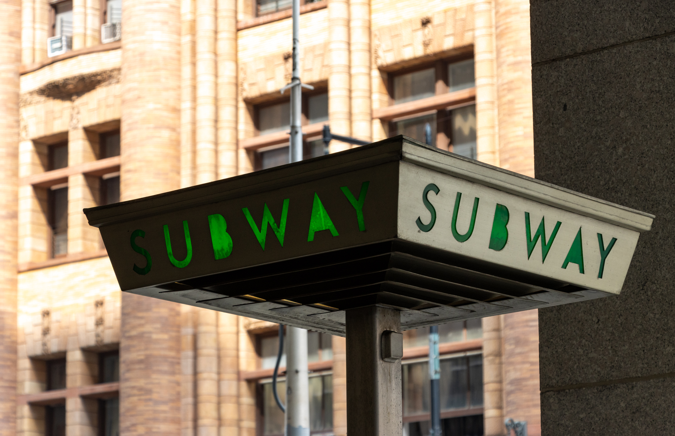 a subway sign outside of jay street in downtown brooklyn