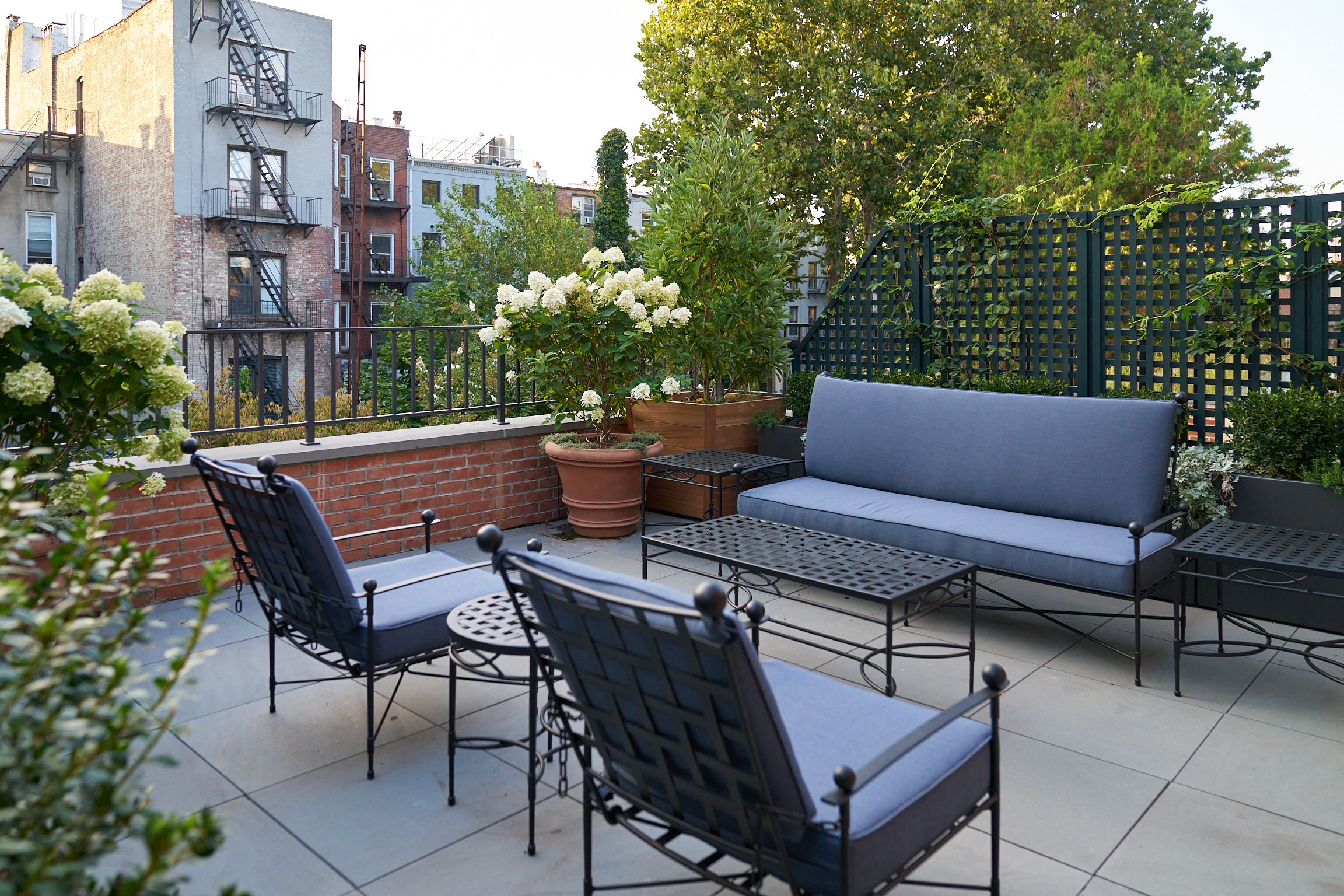 ROOF DECK WITH BLUE FURNITURE