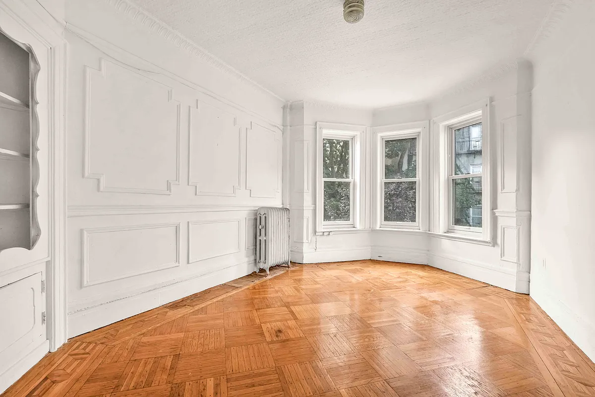 empty bedroom with windows