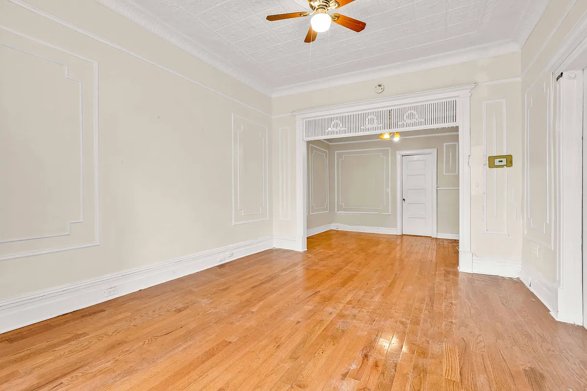 empty living room with wooden detail