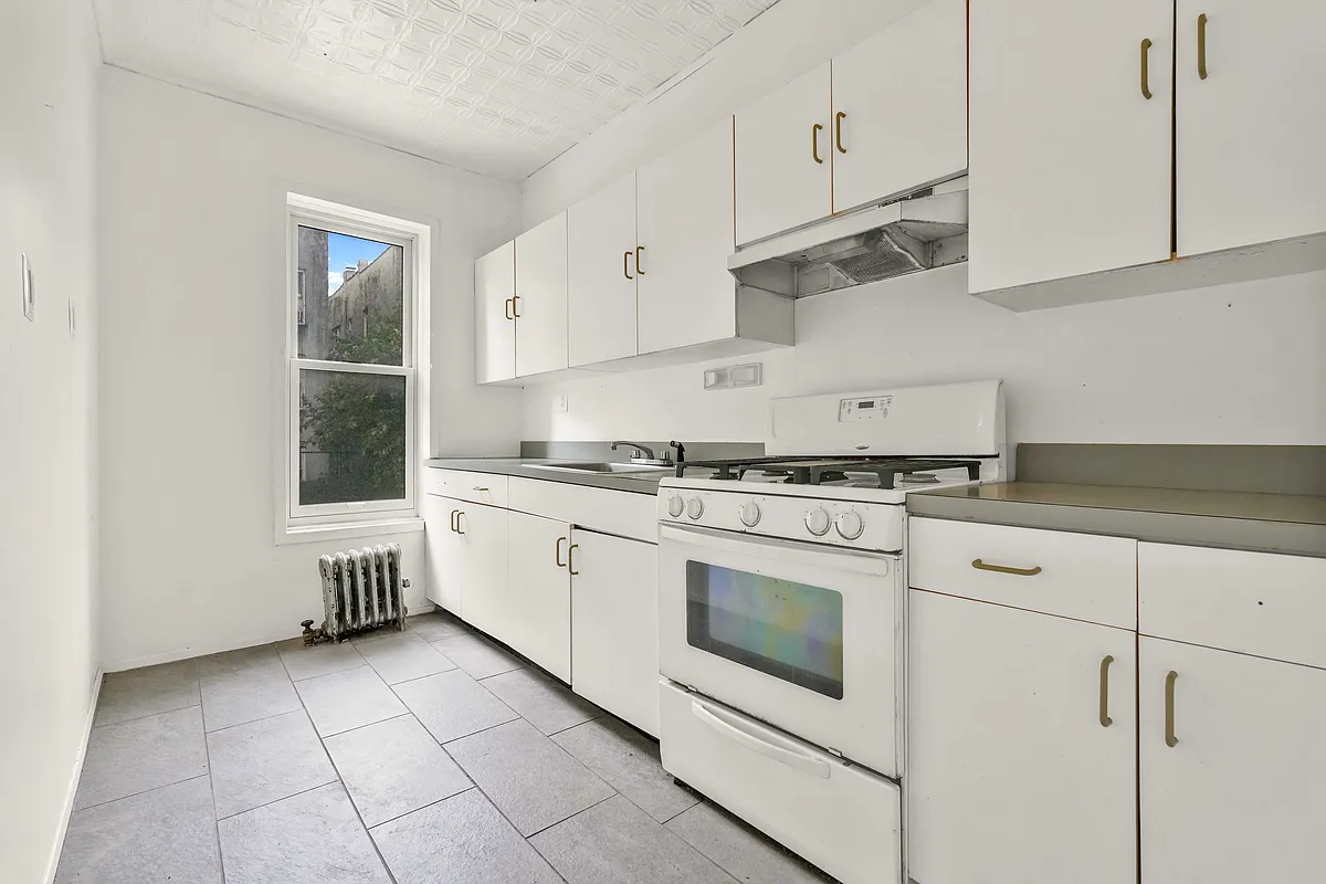 kitchen with white cabinets