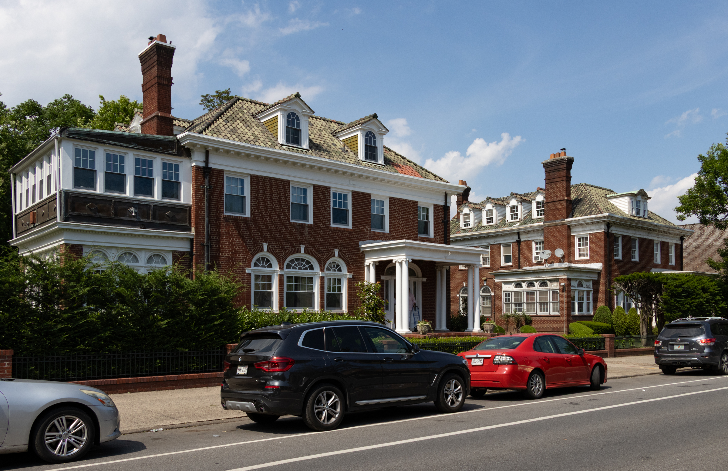 brooklyn - a streetview in prospect lefferts gardens with brick houses and parked cars