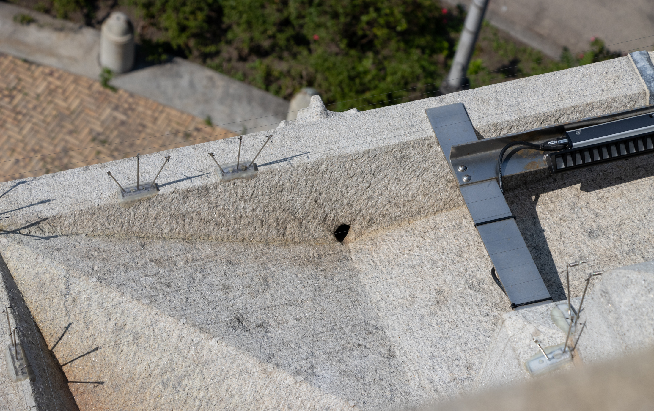 view of the original gutter with a drain hole