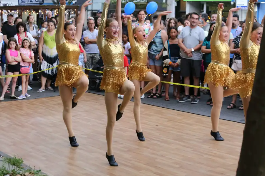 dancers in gold costumes
