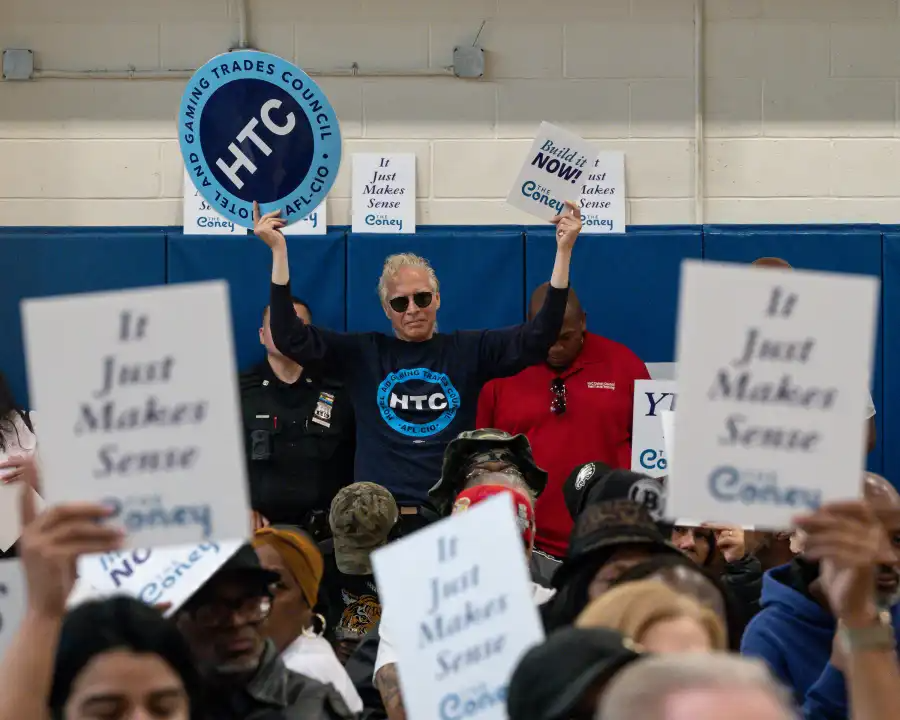 people holding signs