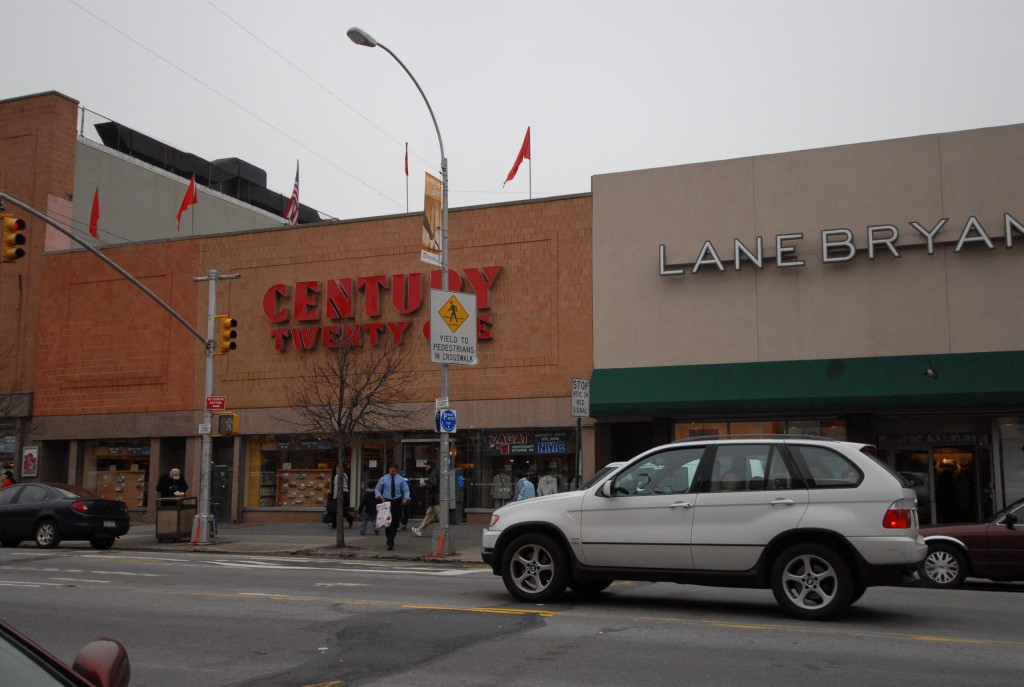 a low scale, brick building with century 21 in red lettering