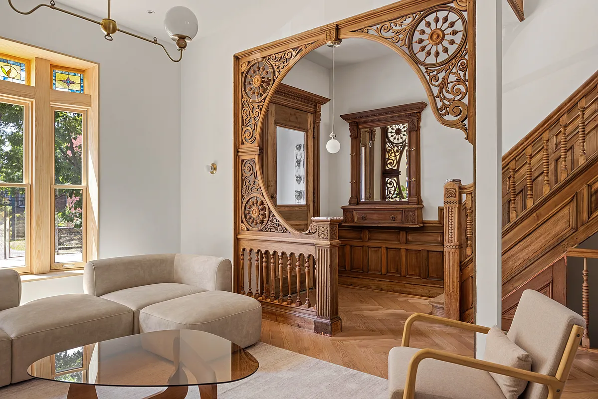 a fretwork screen dividing the parlor and entry