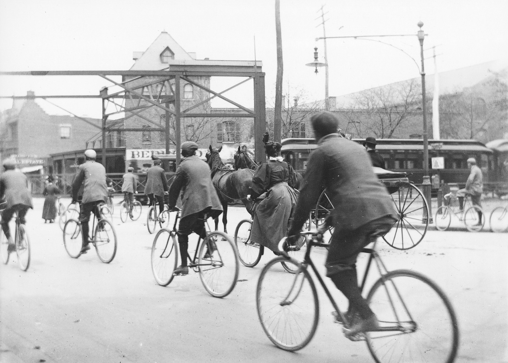 black and white photo of cyclists