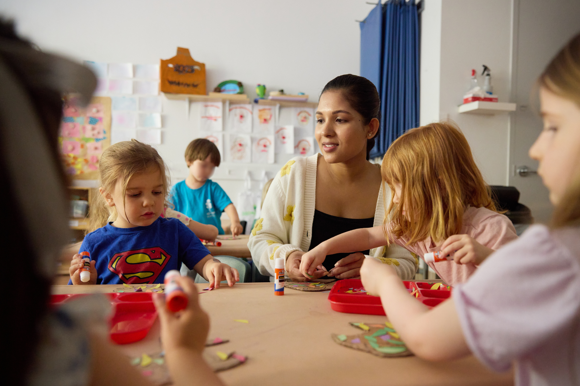 teacher among her young students