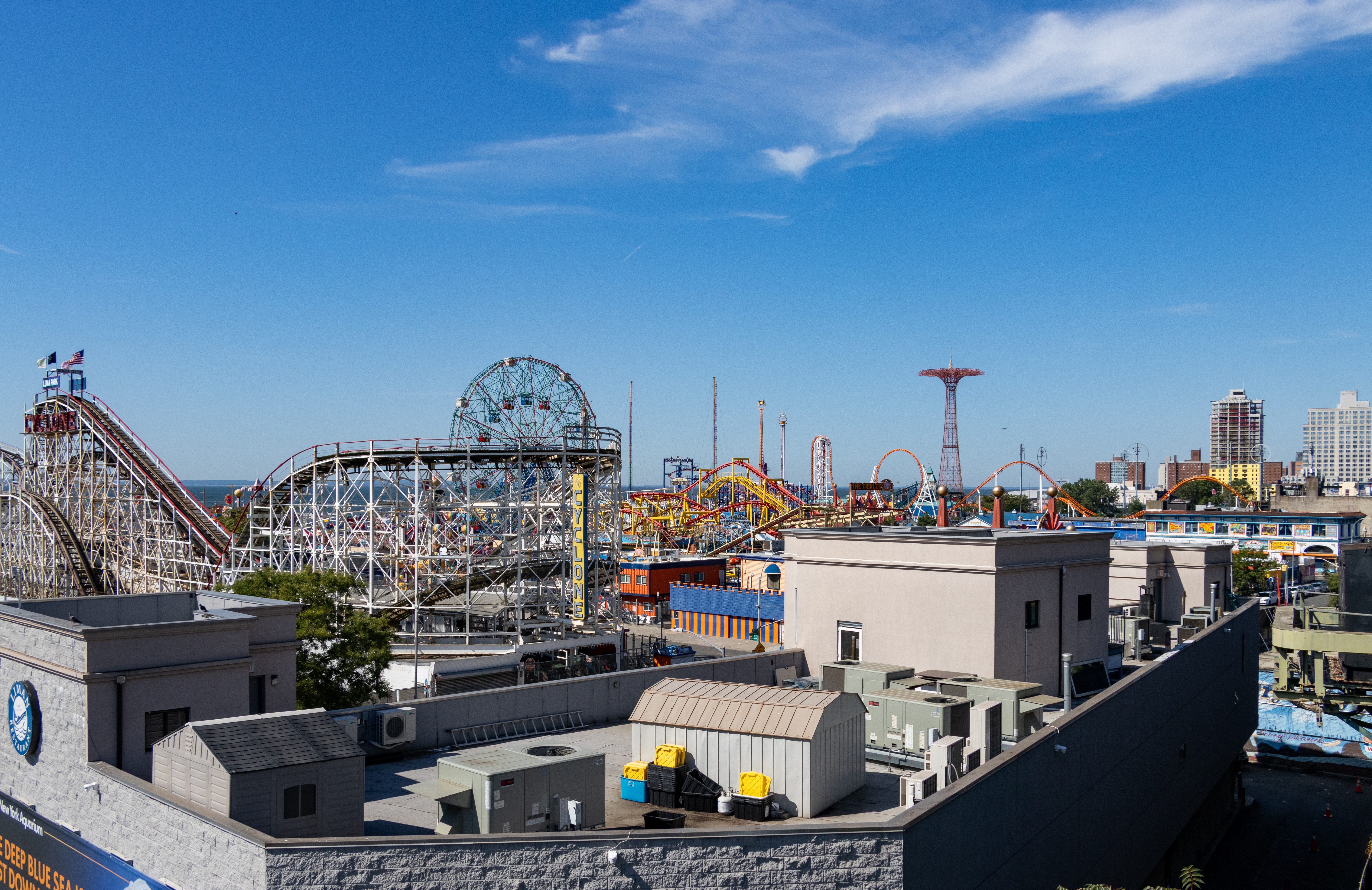 view of rides at Coney Island from the subway train platform