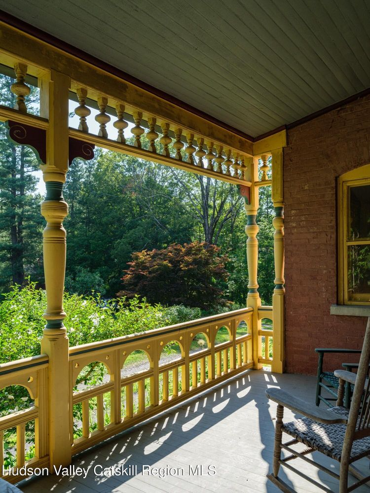 porch detail showing multi-colored paint job