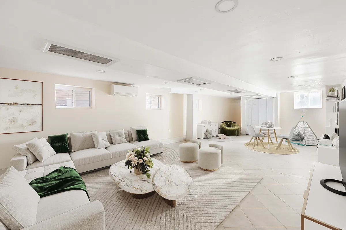virtually staged basement with tile floor and room for seating and play areas
