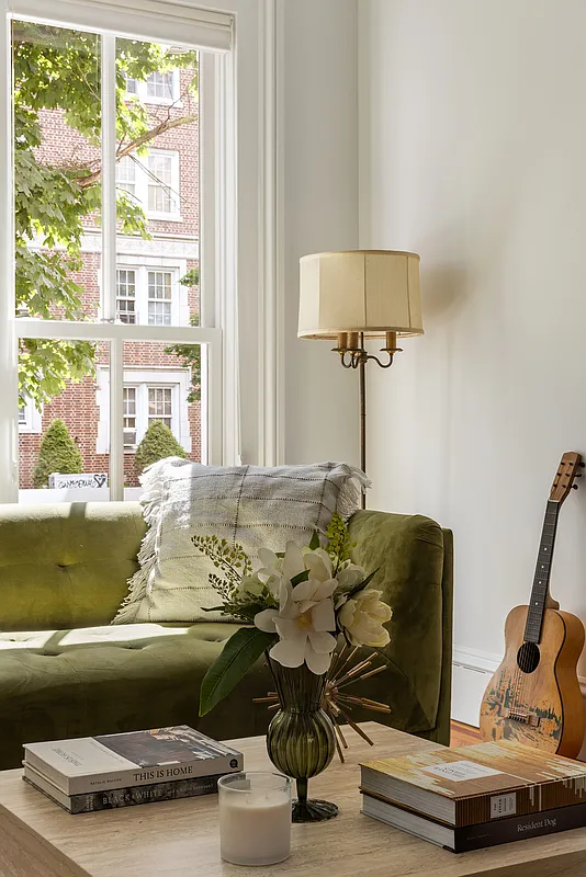 detail of the green sofa in the parlor