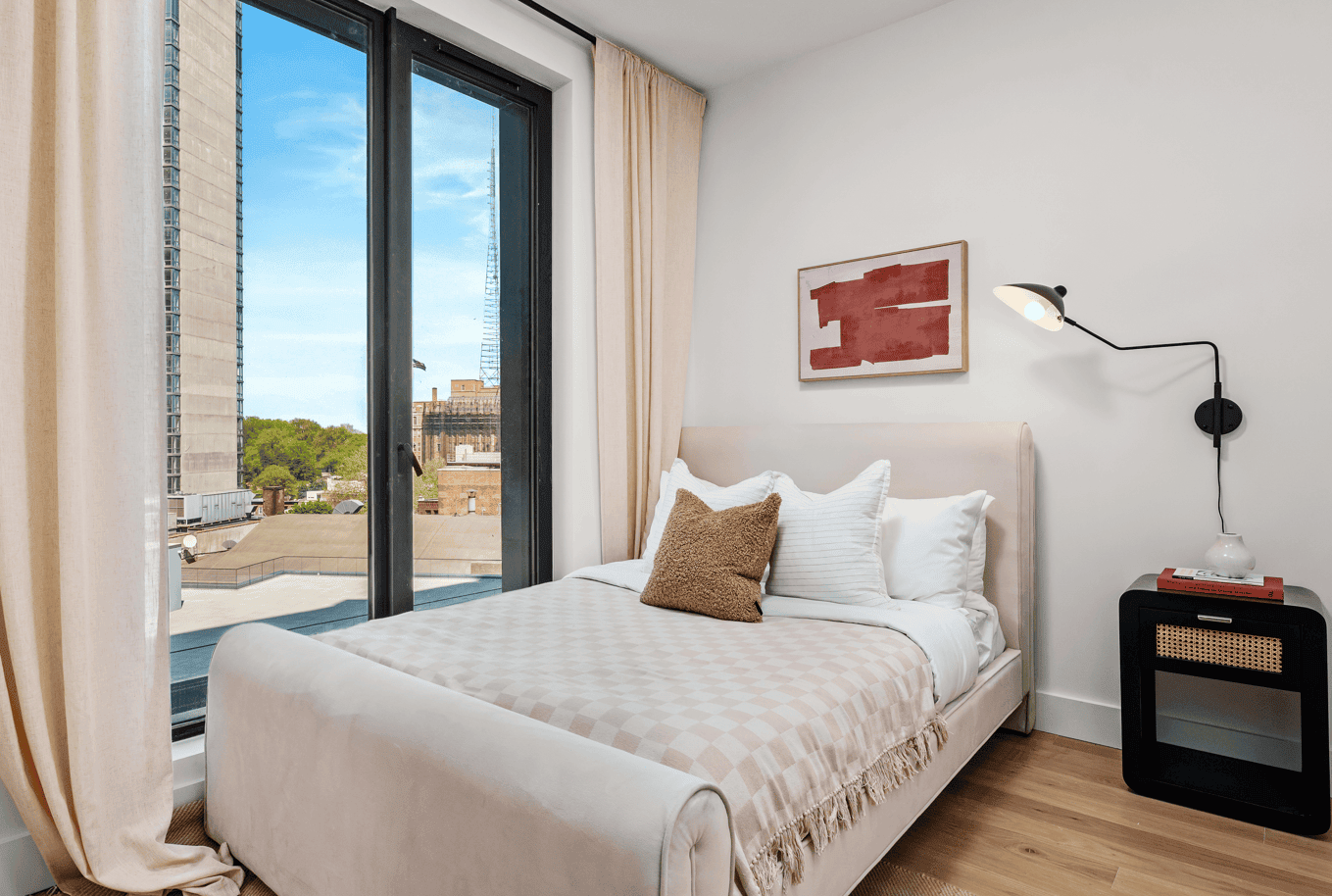 bedroom with floor to ceiling windows