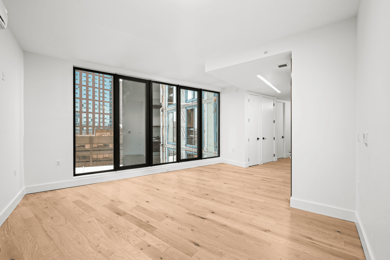 room with floor to ceiling windows