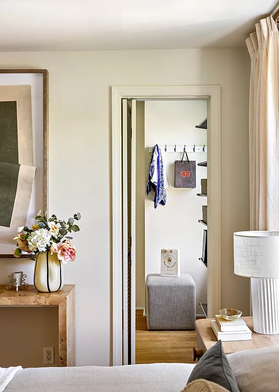 bedroom with view into a petite dressing room