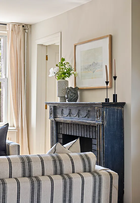 den with a painted gray mantel
