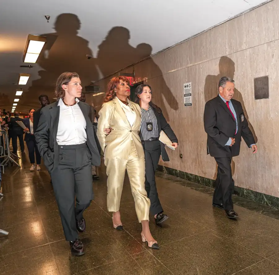 Ingrid Lewis-Martin, a former senior aide to Mayor Eric Adams, is escorted by detectives in handcuffs at New York County Criminal Court on Aug.ust 21, 2025