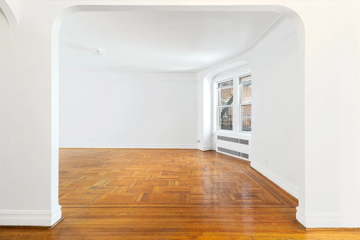 arched doorway between foyer and living room