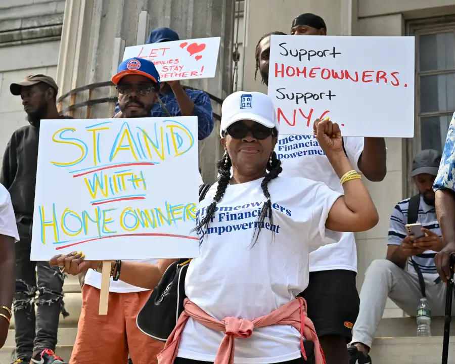 woman holding a sign