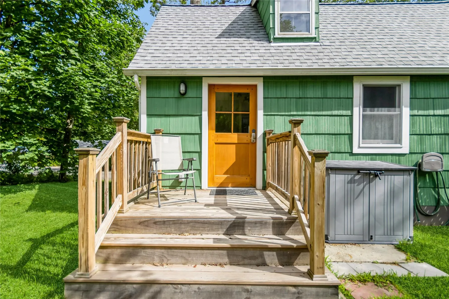 small rear stoop with room for a chair