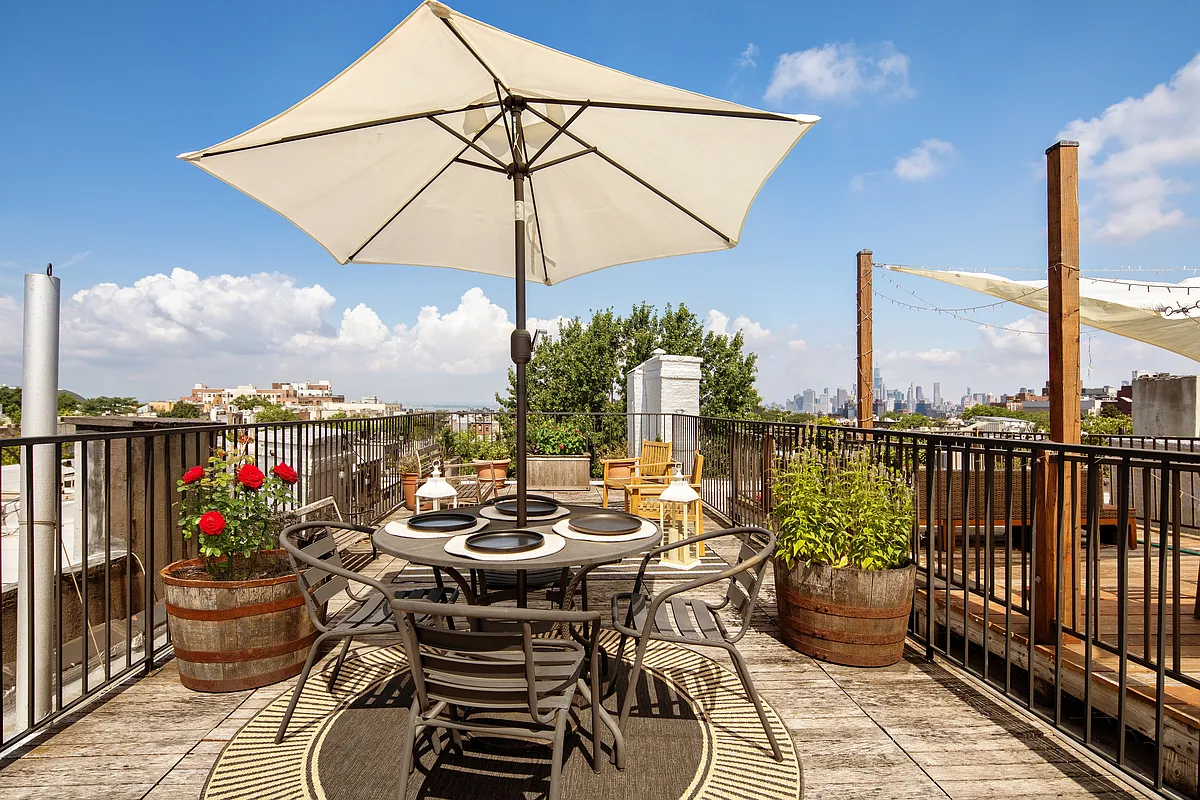 roof deck with room for a dining and a seating area