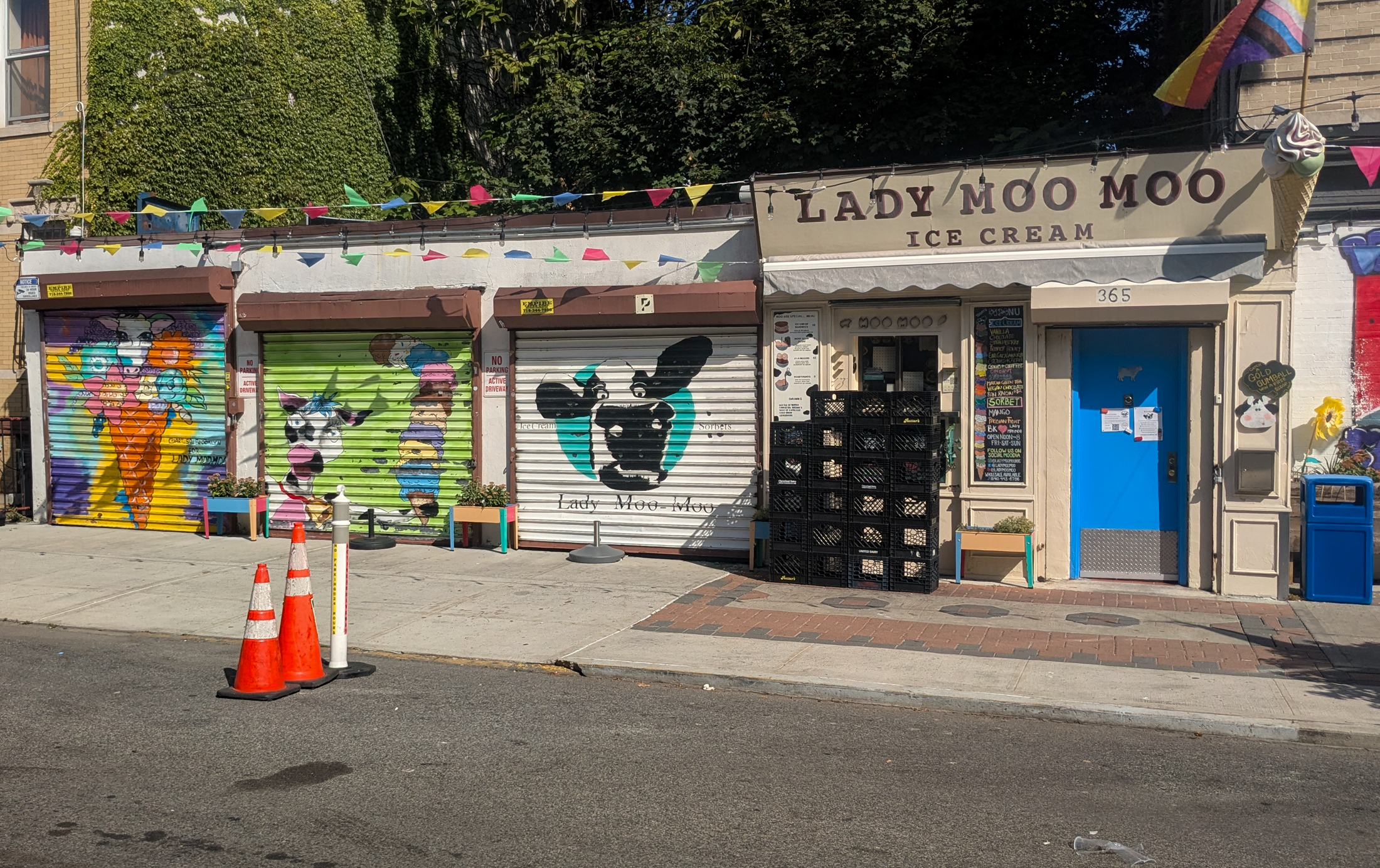 brightly painted security gates on an ice cream shop