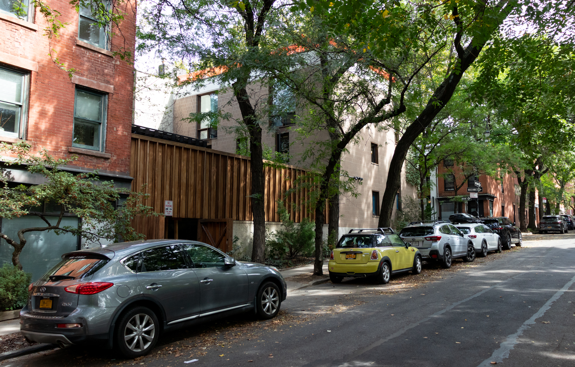 view of side facade with orange netting visible on roof
