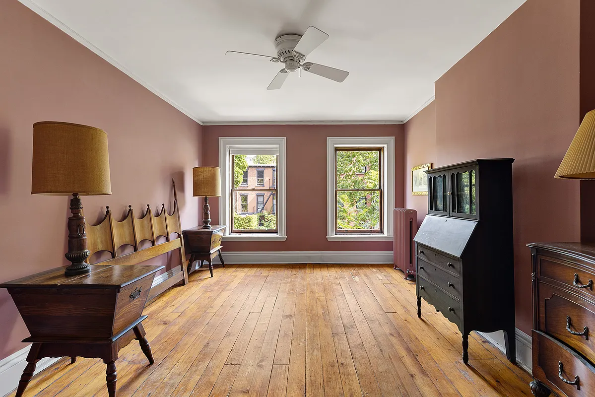bedroom with mauve painted walls