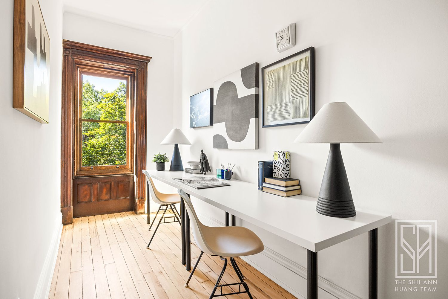 narrow bedroom set up as an office