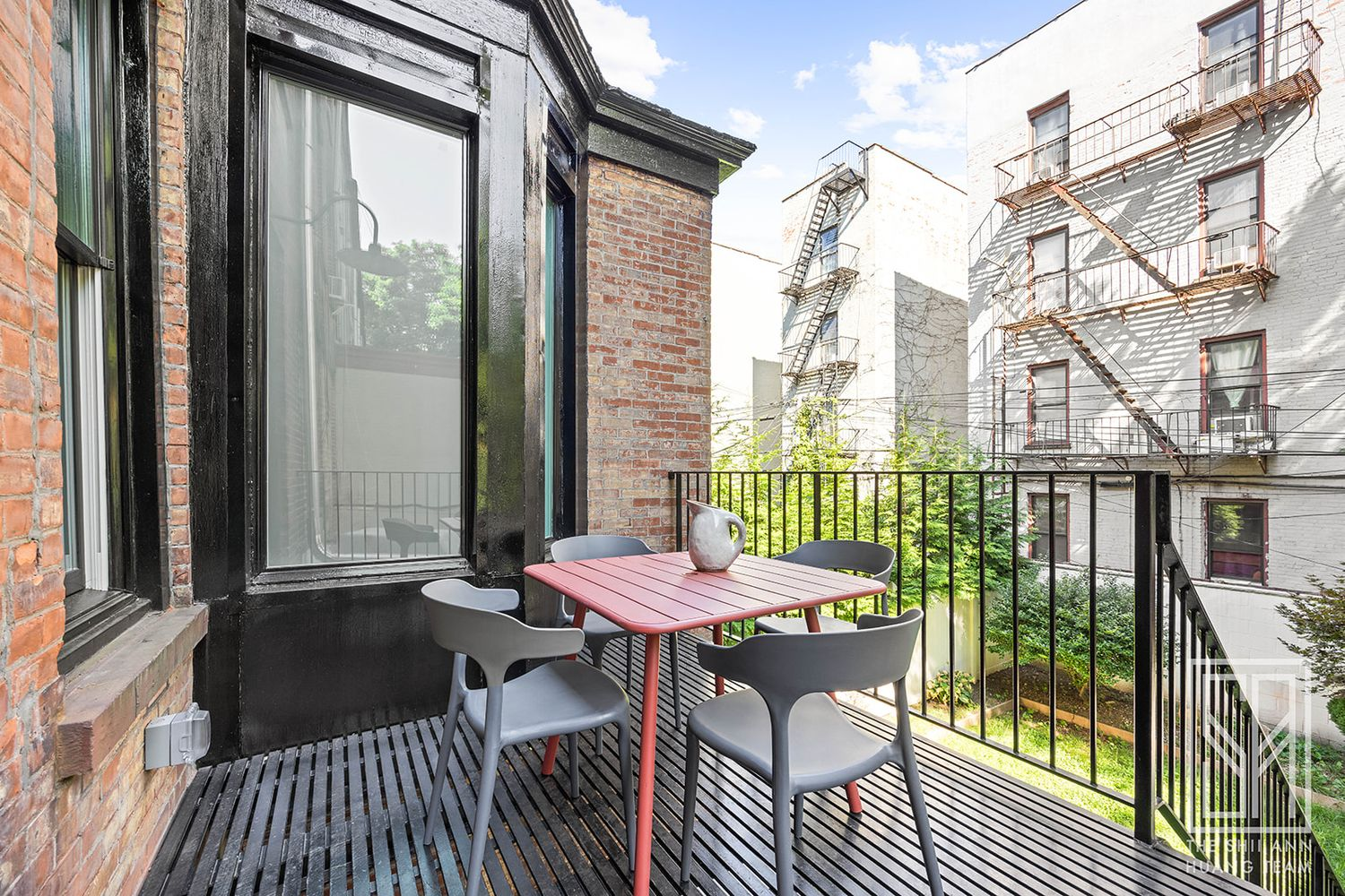 rear deck with room for a small table and chairs