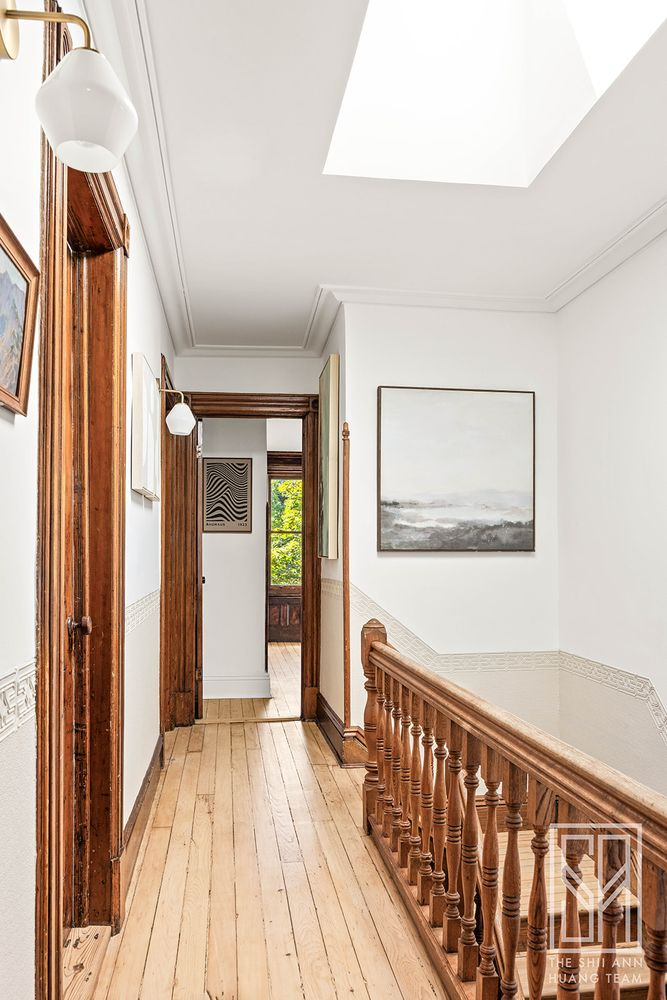 upstairs hall with skylight